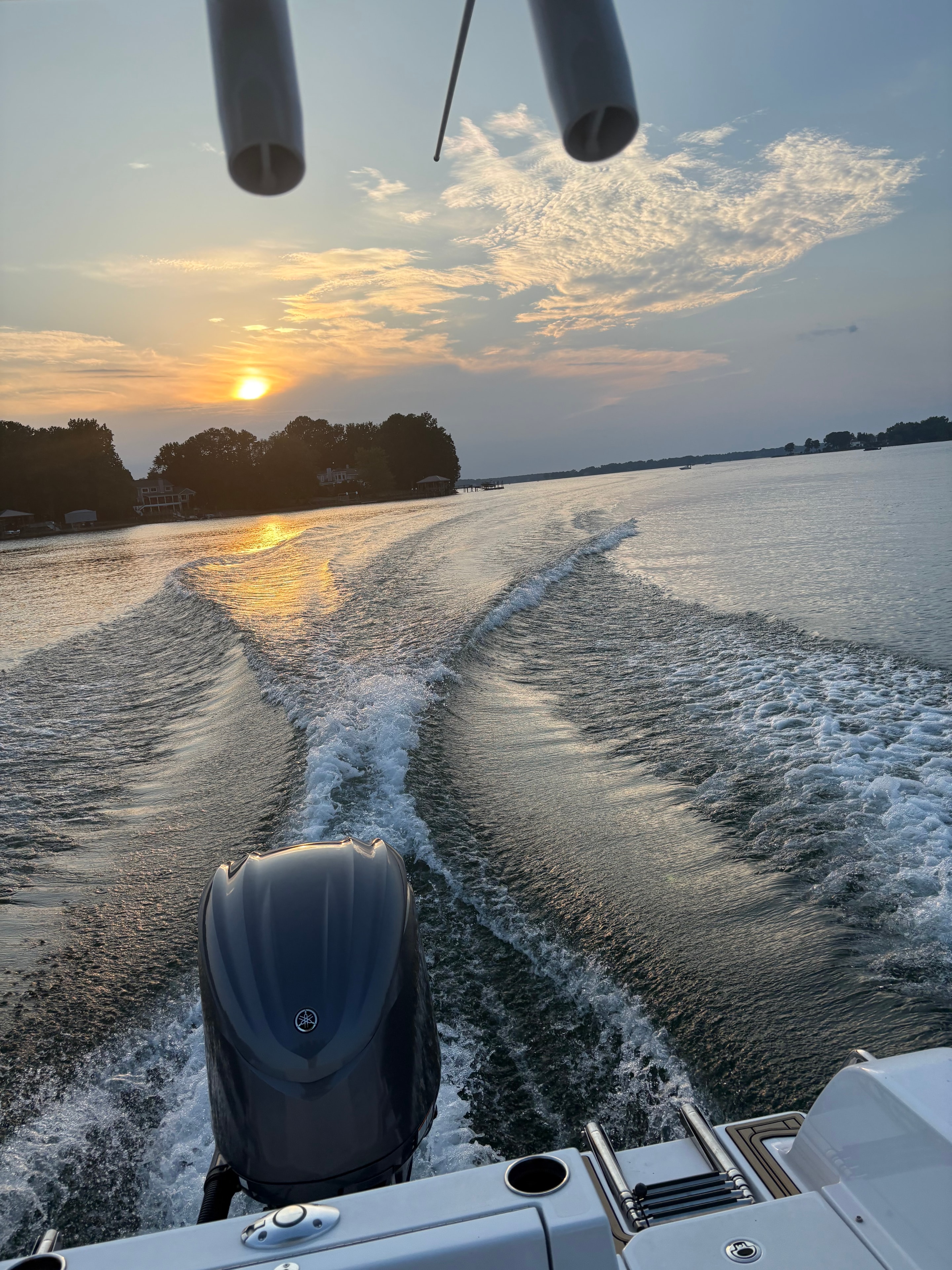 Yamaha 300 engine and wake at dawn on Lake Norman