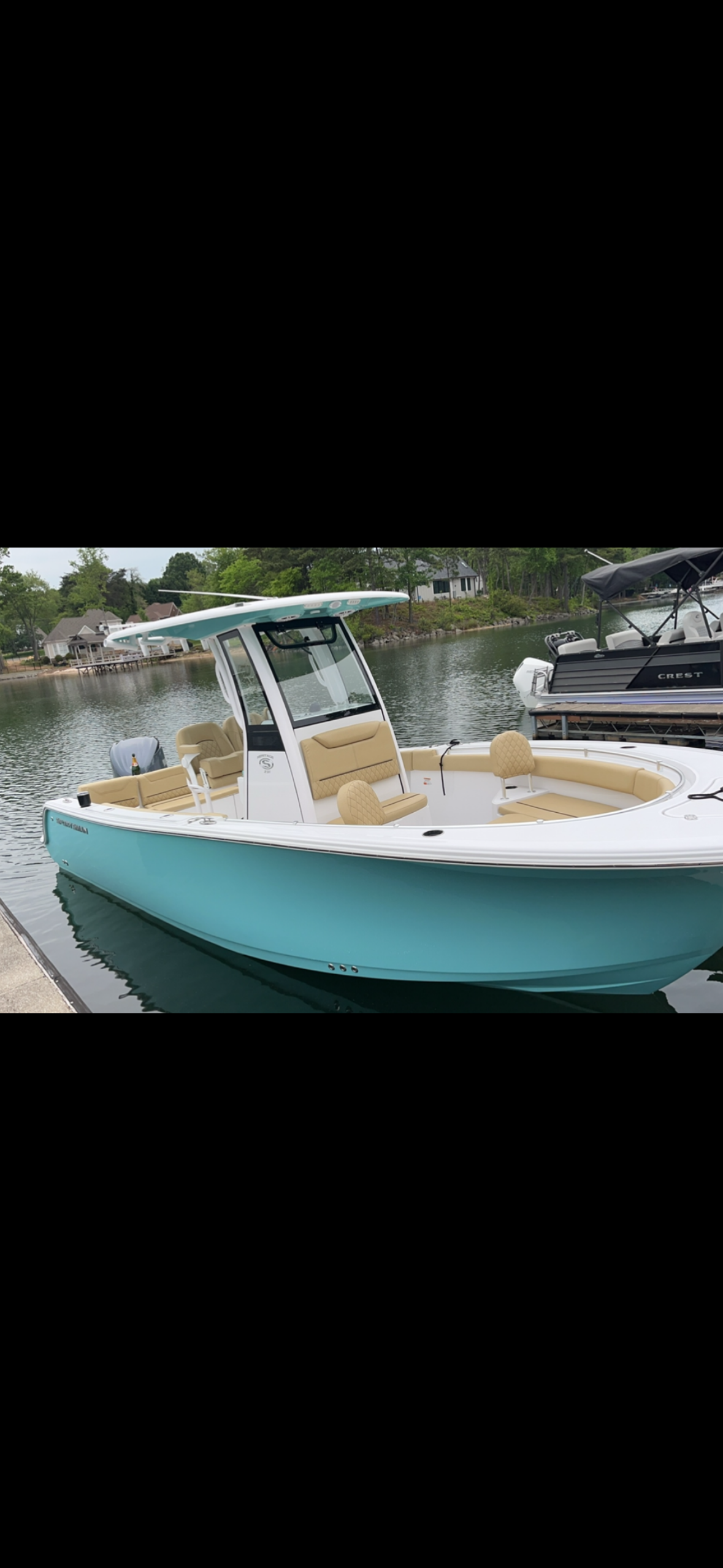 Boat bow and seating area at dock