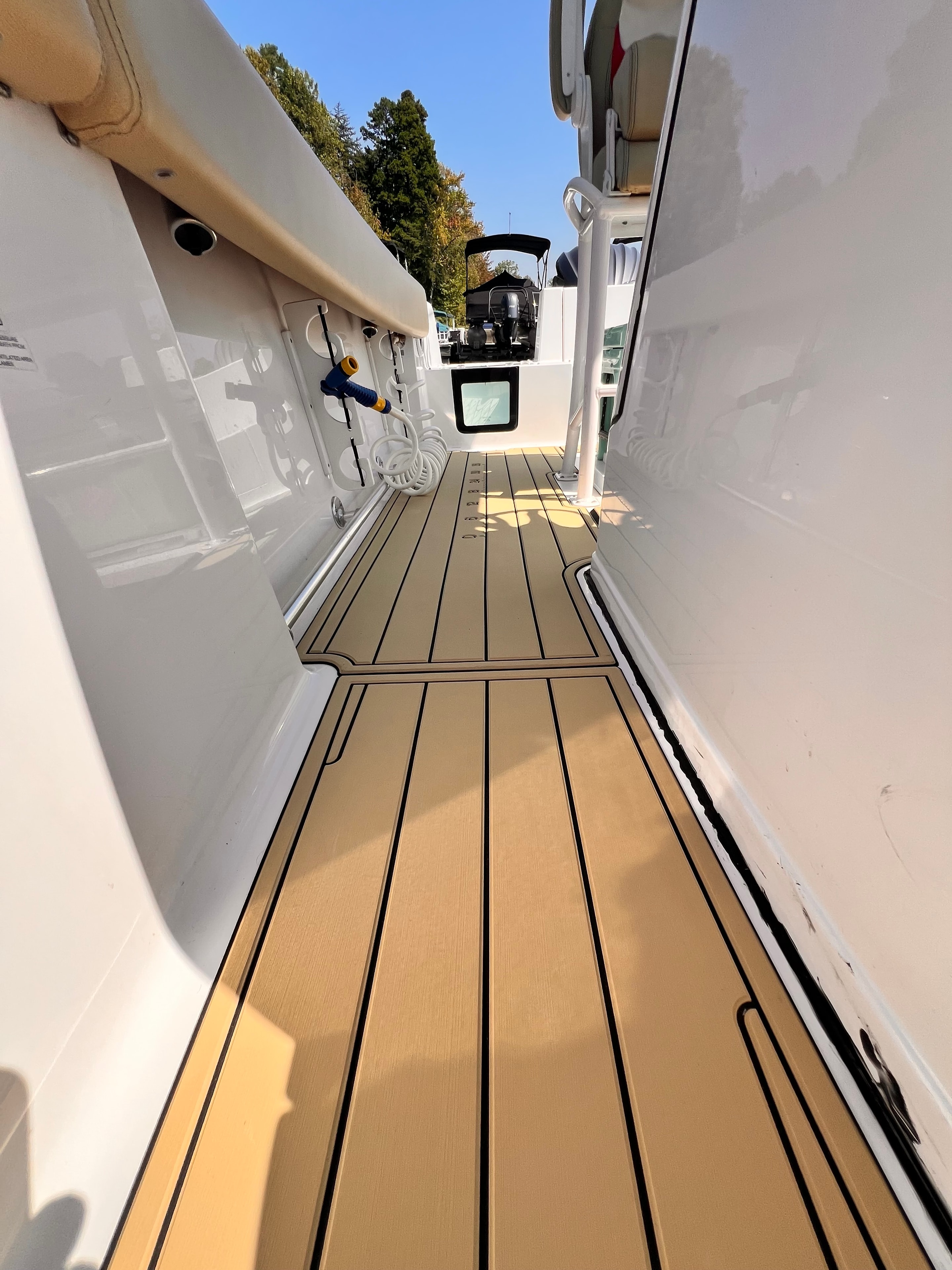 Teak deck detail and boat interior